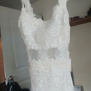White lace cocktail dress.